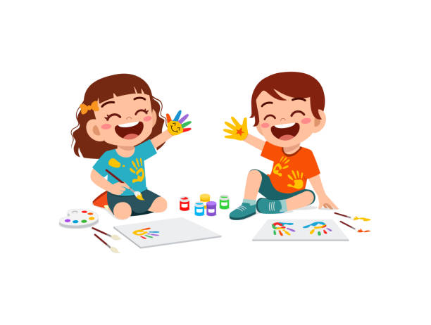 cute little boy and girl using paint to hand for art
